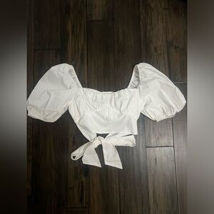 White crop shirt. I think from vestique- small! I wore in my bachelorette trip